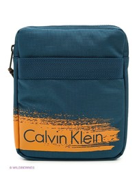 Темно-синяя сумка почтальона от Calvin Klein