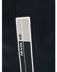 Темно-синяя сумка почтальона от Prada