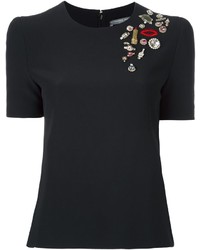 Черная блузка с украшением от Alexander McQueen