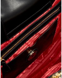Черная большая сумка с рельефным рисунком от Love Moschino