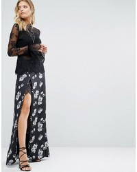 Черная длинная юбка с цветочным принтом от Majorelle