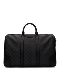 Мужская черная дорожная сумка из плотной ткани от Gucci