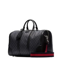 Мужская черная дорожная сумка из плотной ткани от Gucci