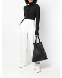 Черная кожаная большая сумка от Jil Sander