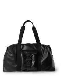 Мужская черная кожаная дорожная сумка от Alexander McQueen