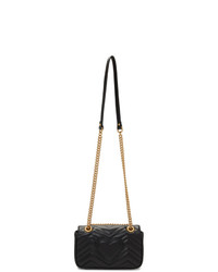 Черная кожаная стеганая сумка-саквояж от Gucci