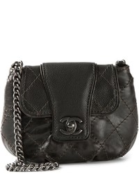 Черная кожаная стеганая сумка-саквояж от Chanel