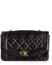 Черная кожаная стеганая сумка-саквояж от Chanel