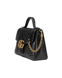 Черная кожаная стеганая сумка-саквояж от Gucci