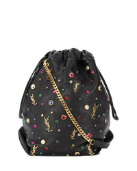 Черная кожаная сумка-мешок с украшением от Saint Laurent