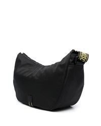 Черная кожаная сумка почтальона от Moschino