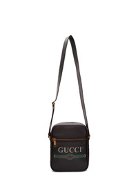 Черная кожаная сумка почтальона от Gucci