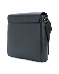 Черная кожаная сумка почтальона от Michael Kors