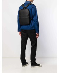 Черная кожаная сумка почтальона от Calvin Klein