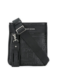 Черная кожаная сумка почтальона от Versace Jeans