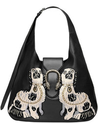 Женская черная кожаная сумка с вышивкой от Gucci