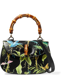 Женская черная кожаная сумка с принтом от Gucci