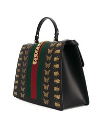 Черная кожаная сумка-саквояж с принтом от Gucci