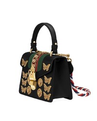 Черная кожаная сумка-саквояж с украшением от Gucci