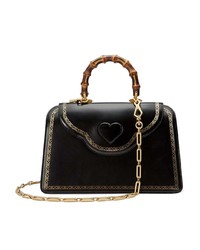 Черная кожаная сумка-саквояж от Gucci