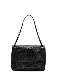 Черная кожаная сумка-саквояж от Saint Laurent