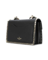 Черная кожаная сумка через плечо с украшением от Valentino