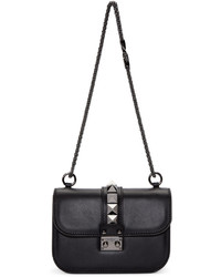 Женская черная кожаная сумка от Valentino