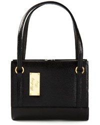 Черная кожаная сумочка от Moschino