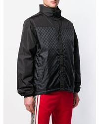 Мужская черная куртка-пуховик с принтом от Gucci