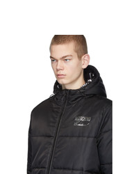 Мужская черная куртка-пуховик от Moschino