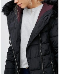 Женская черная куртка от Puffa