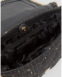 Черная стеганая сумка через плечо от Juicy Couture