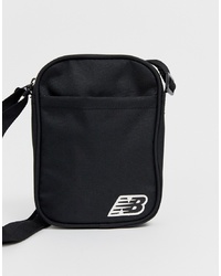 Черная сумка почтальона из плотной ткани от New Balance