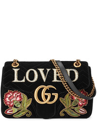 Женская черная сумка с вышивкой от Gucci