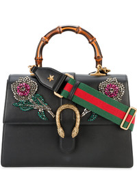 Женская черная сумка с украшением от Gucci