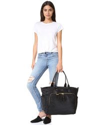 Женская черная сумка от Tumi