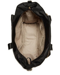 Женская черная сумка от Tumi