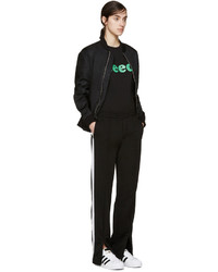 Женская черная футболка с принтом от 6397