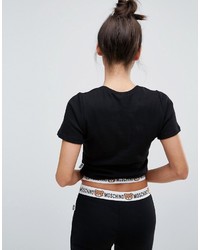 Женская черная футболка от Moschino