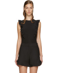 Черная шелковая блузка с рюшами от Fendi