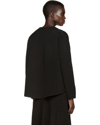 Черная шелковая блузка от Studio Nicholson