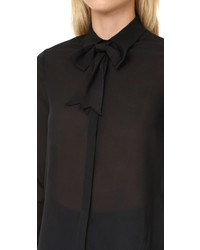 Черная шелковая блузка от Alice + Olivia