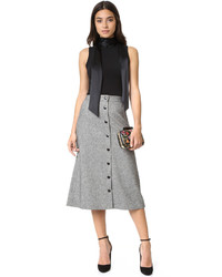 Черная шелковая блузка от Alice + Olivia