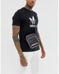 Черно-белая кожаная сумка почтальона с принтом от adidas Originals