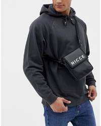 Черно-белая кожаная сумка почтальона с принтом от Nicce
