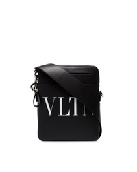 Черно-белая кожаная сумка почтальона с принтом от Valentino