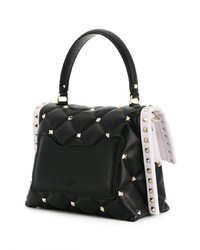 Черно-белая кожаная сумка-саквояж от Valentino
