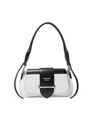 Черно-белая кожаная сумка-саквояж от Prada