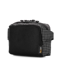 Мужская черно-белая поясная сумка от Stussy