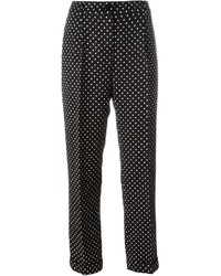 Женские черно-белые брюки-галифе в горошек от Dolce & Gabbana